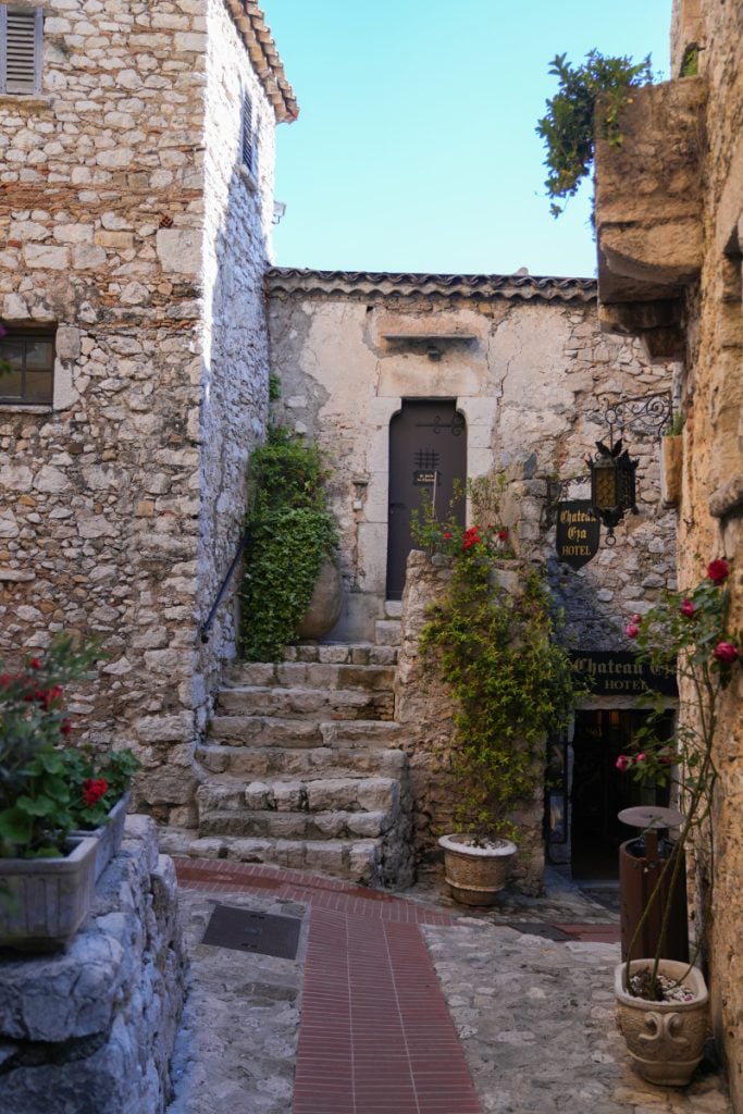 Stone steps between historic buildings in Èze village