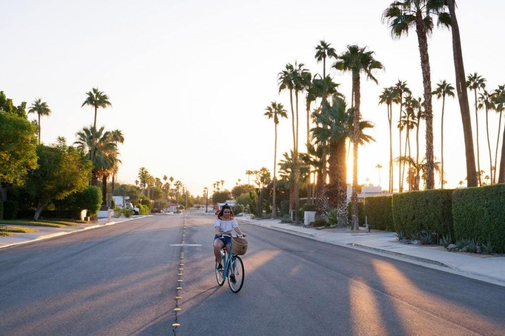Biking through Palm Springs on cruiser bikes from ARRIVE