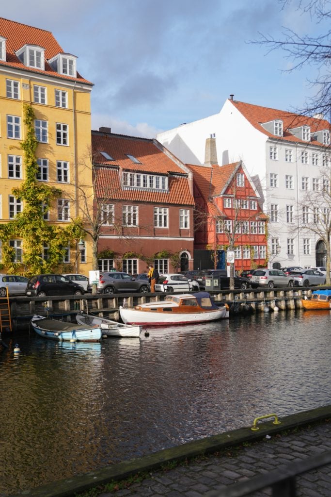 Colorful houses and boats along a Christianshavn canal