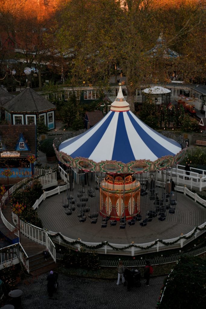 Striped carousel viewed from above at Tivoli Gardens