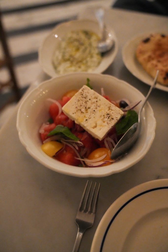 Greek salad with tomatoes, olives and feta at Delphine