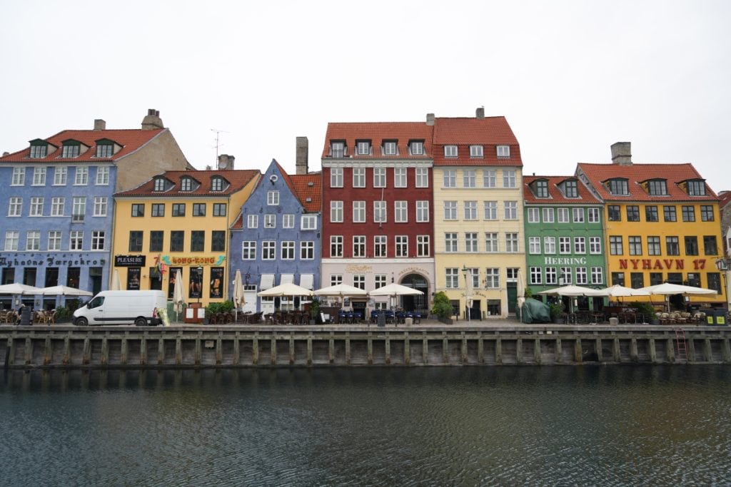 Colorful Nyhavn waterfront buildings across the canal