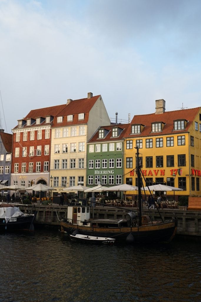Historic ships moored along Nyhavn's colorful waterfront