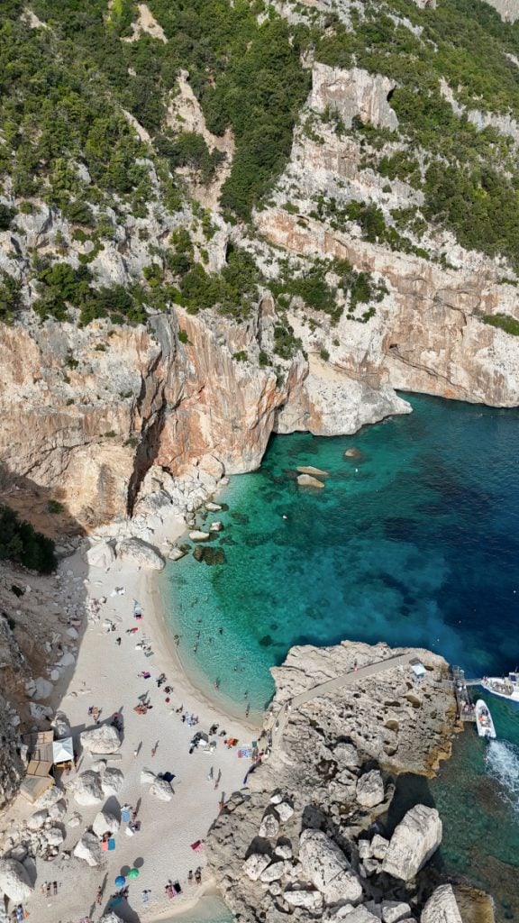 Clear turquoise water at Cala Mariolu beach on the Baunei Coast