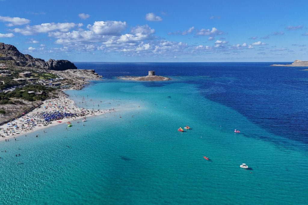 Aerial view of La Pelosa beach and turquoise water in Sardinia