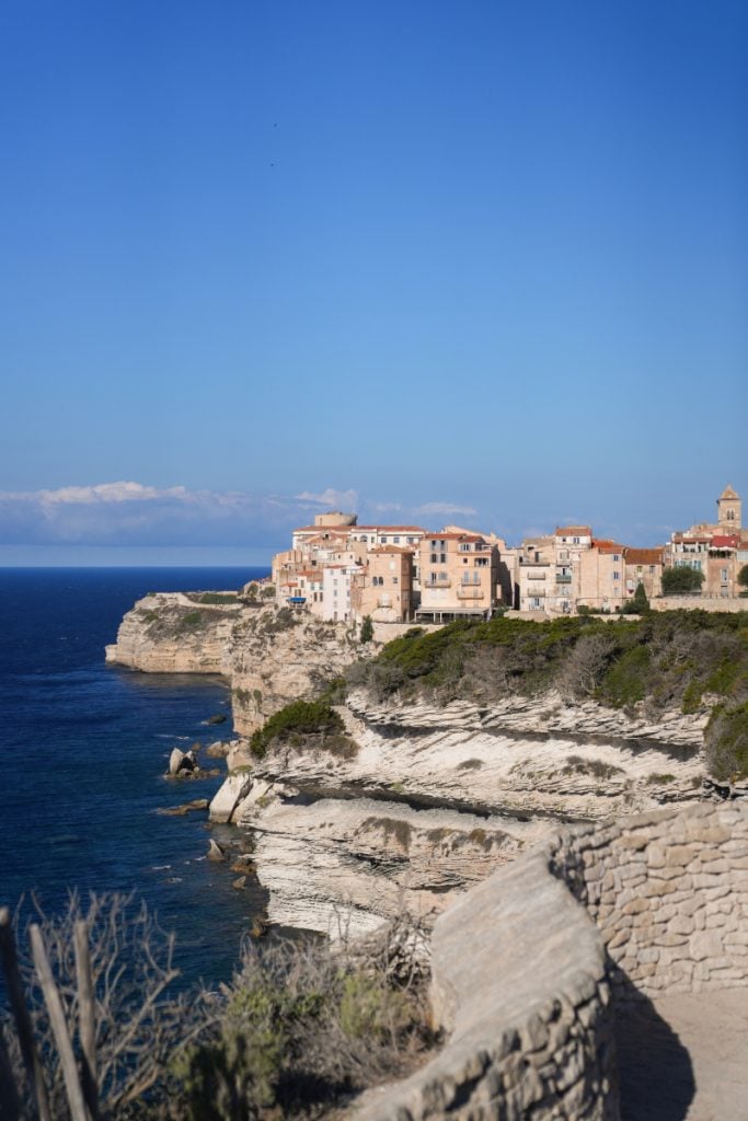Dramatic limestone cliffs and the citadel of Bonifacio seen from the water