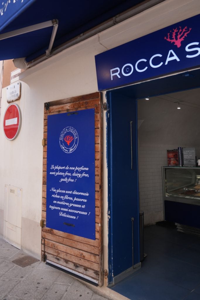 Storefront of Glacier ROCCA SERRA gelato shop in Bonifacio