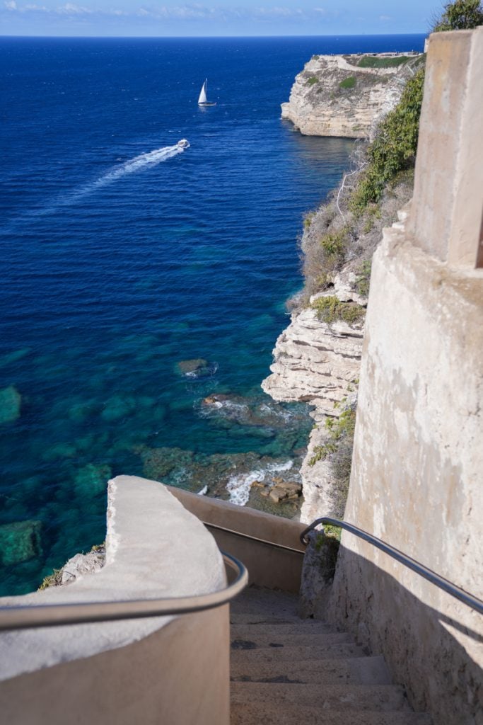 Looking down the steep Escalier du Roy d'Aragon carved into Bonifacio's cliffs