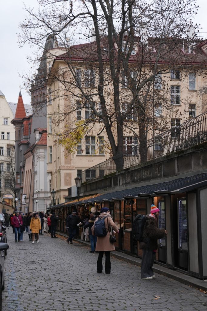 Cobblestone pedestrian street in Prague's Jewish Quarter