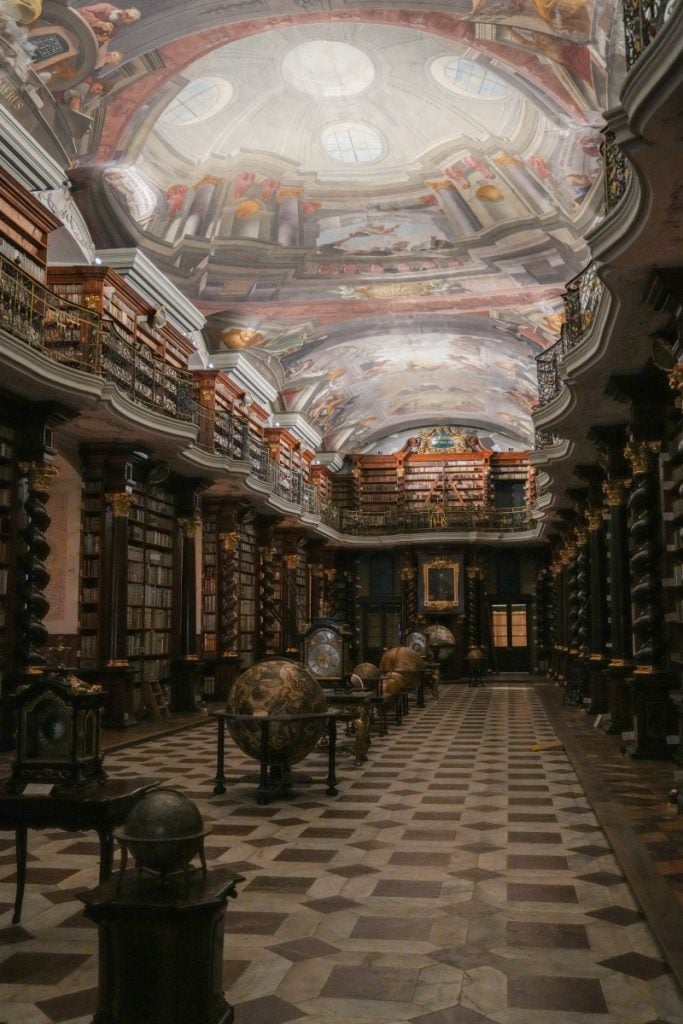 Ornate Baroque interior of the Klementinum Library in Prague