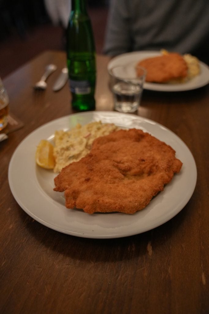 Breaded schnitzel with potato salad at Lokal in Prague
