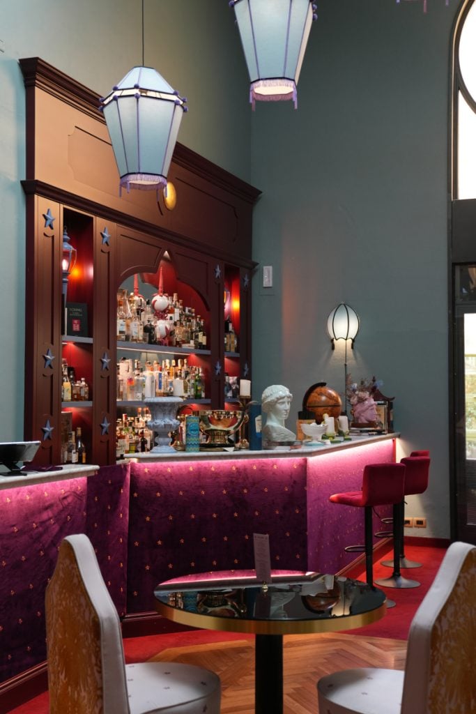Pink bar and pendant lights at Hotel Number Nine