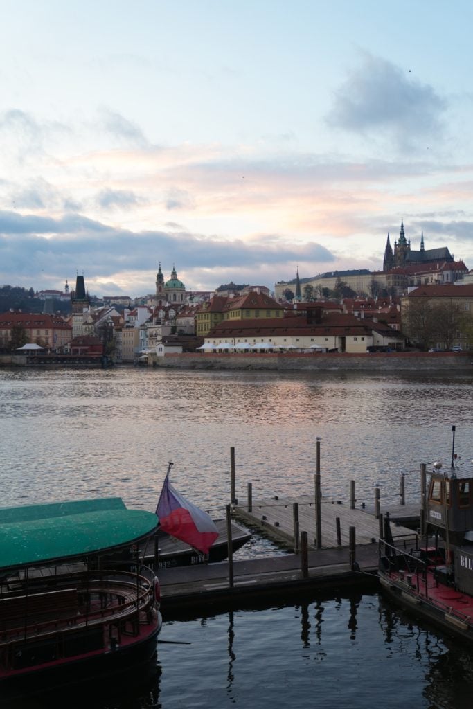Prague Castle across the Vltava River at sunset