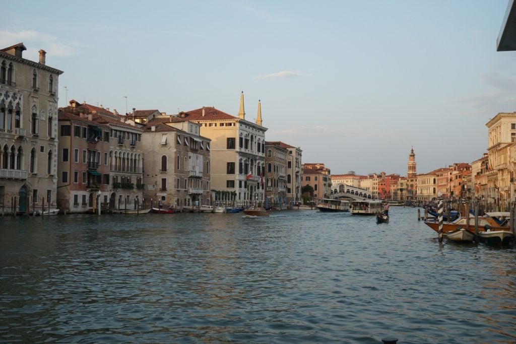 Boats on Venice's Grand Canal with the Rialto Bridge beyond
