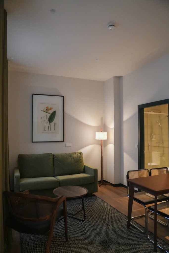 Living and dining area at Batimont Suites
