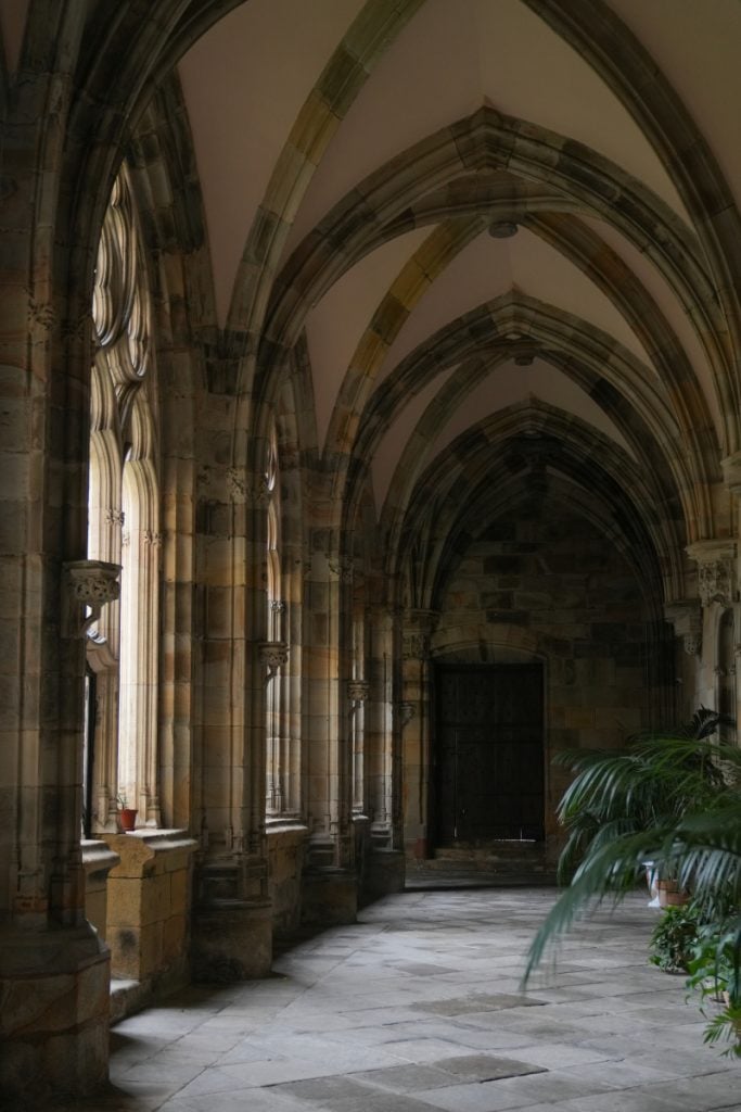 Arched cloister walkway inside Bilbao Cathedral