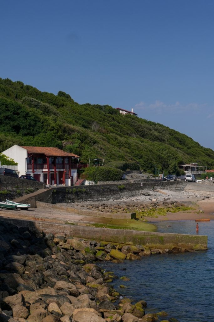 Rocky shoreline and seawall at Guéthary Port