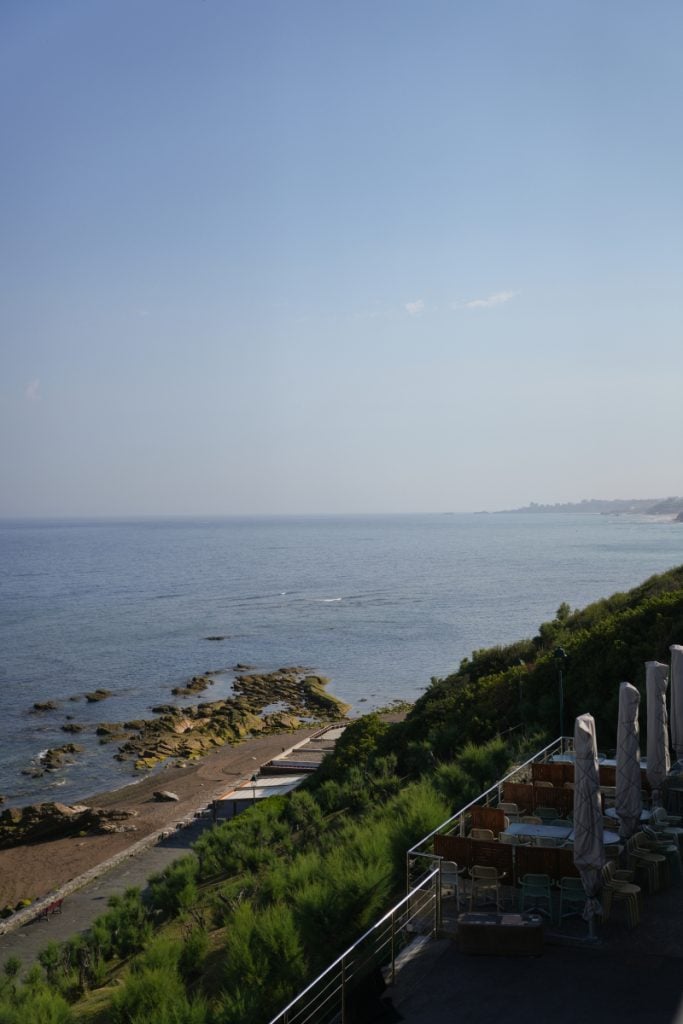 Restaurant terrace overlooking Guéthary's rocky coastline