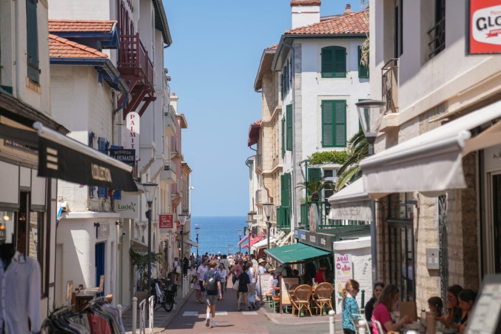 Busy street leading toward Port Vieux in Biarritz