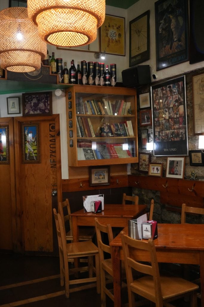 Wooden tables and framed art inside Xukela