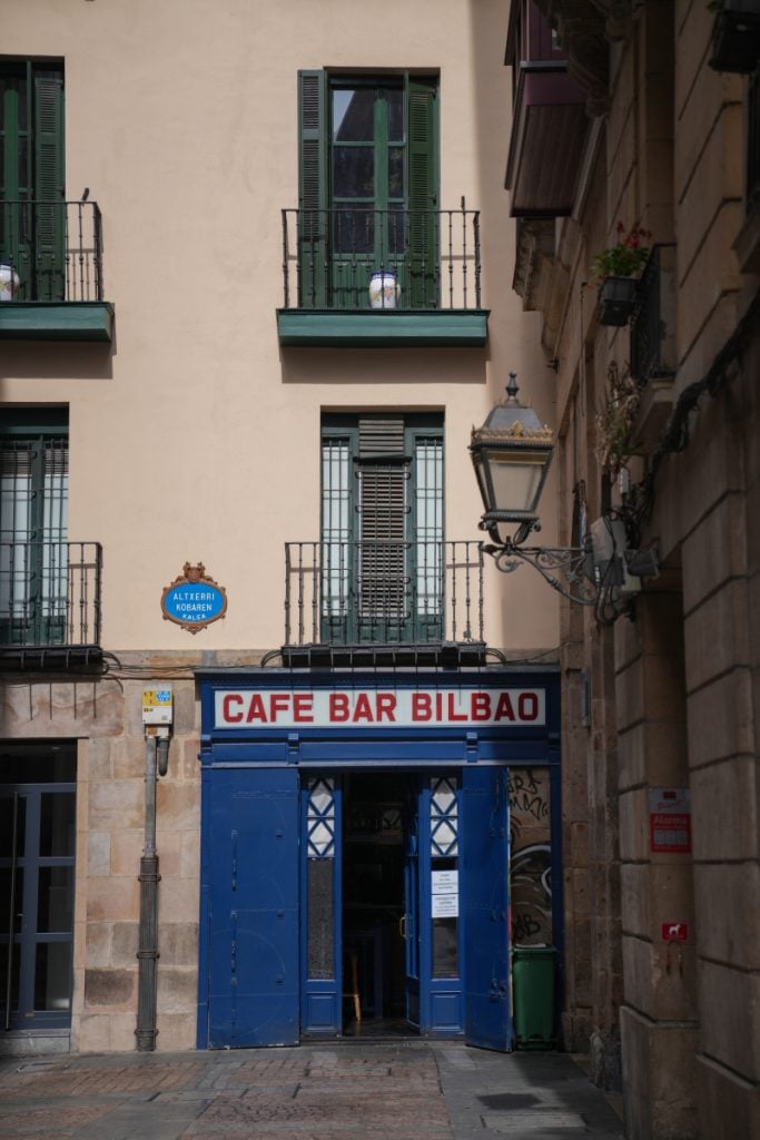 Blue entrance to Café Bar Bilbao
