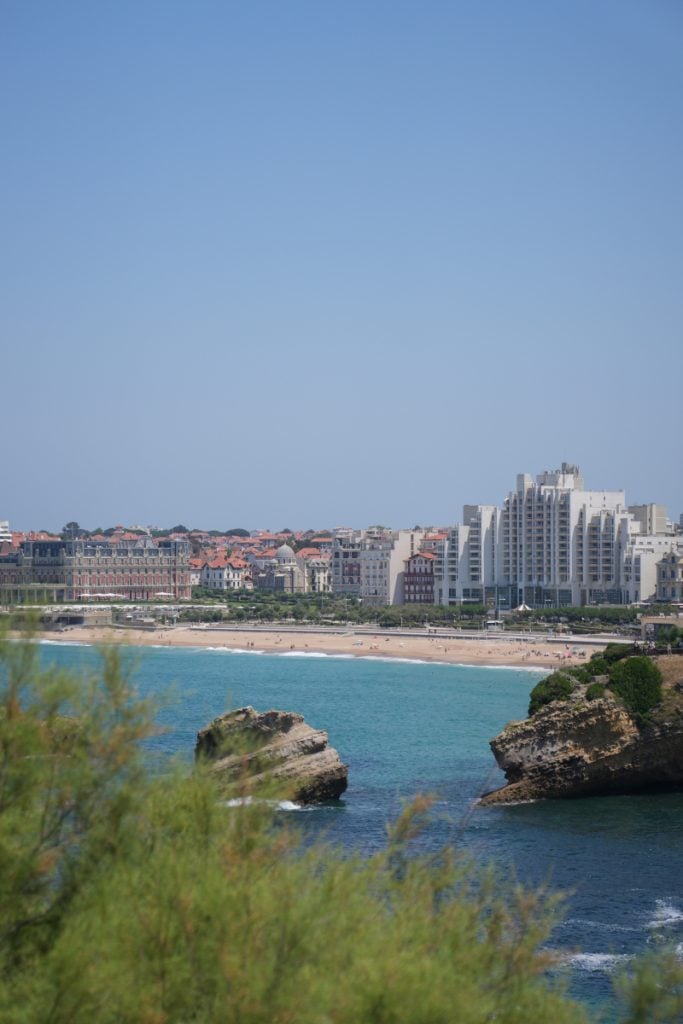 Grande Plage and Biarritz waterfront beyond rocky outcrops
