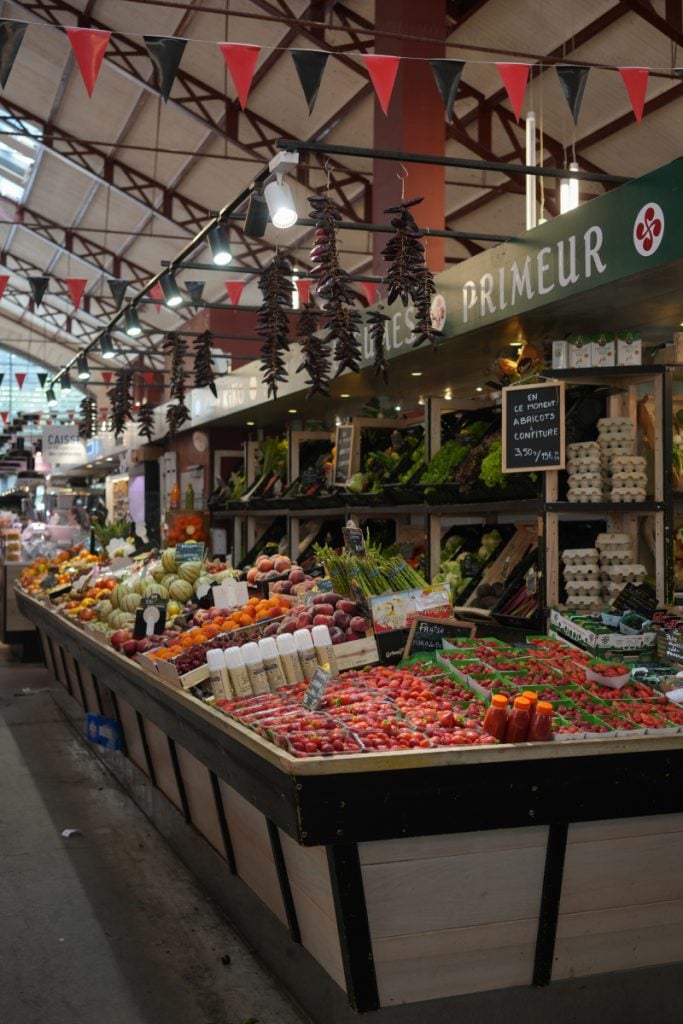 Produce stall inside Les Halles de Biarritz