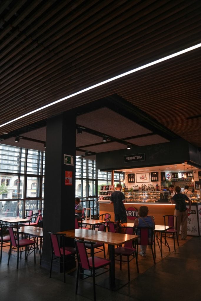 Bar and dining area inside Mercado de la Ribera
