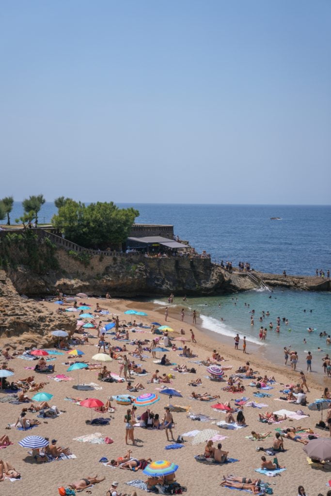 Crowded Plage du Port Vieux cove in Biarritz