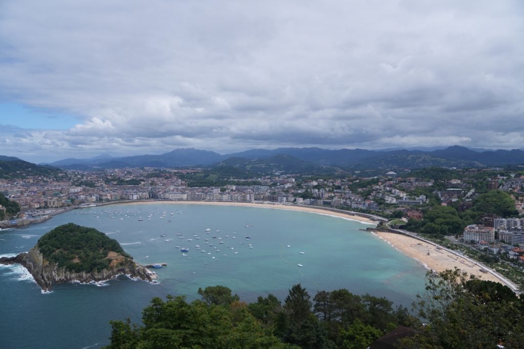 La Concha Bay and San Sebastián beneath cloudy skies