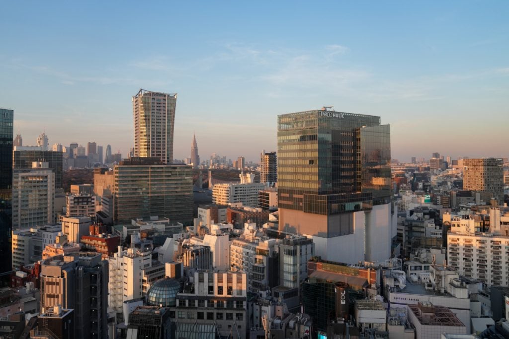 Aerial view of Shibuya neighborhood and crossing at night, Tokyo