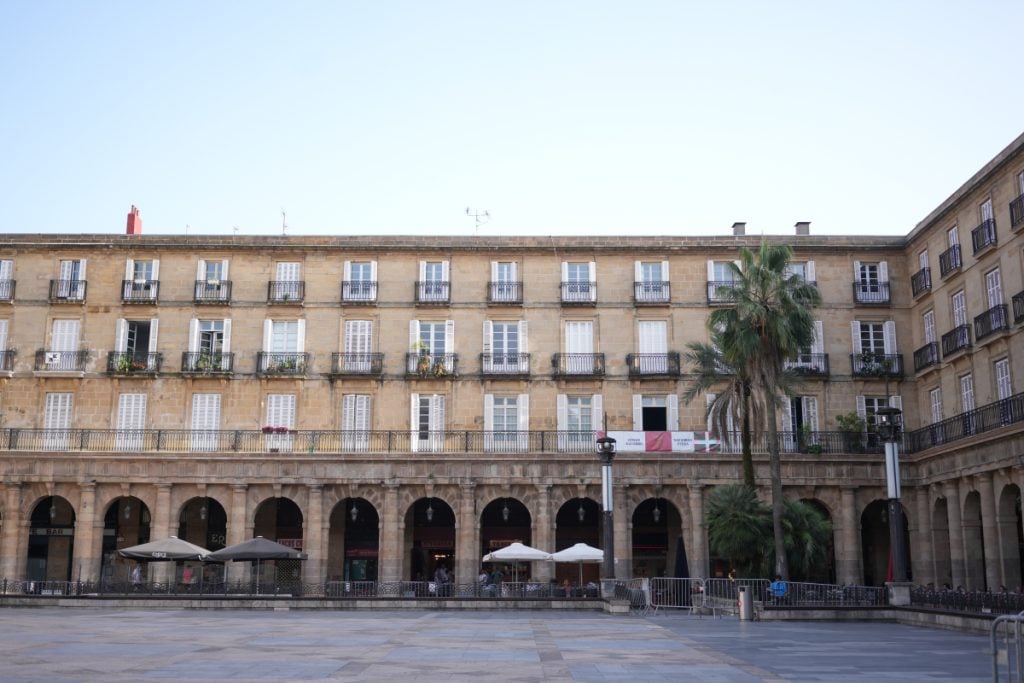 Arcaded buildings surrounding Plaza Nueva in Bilbao