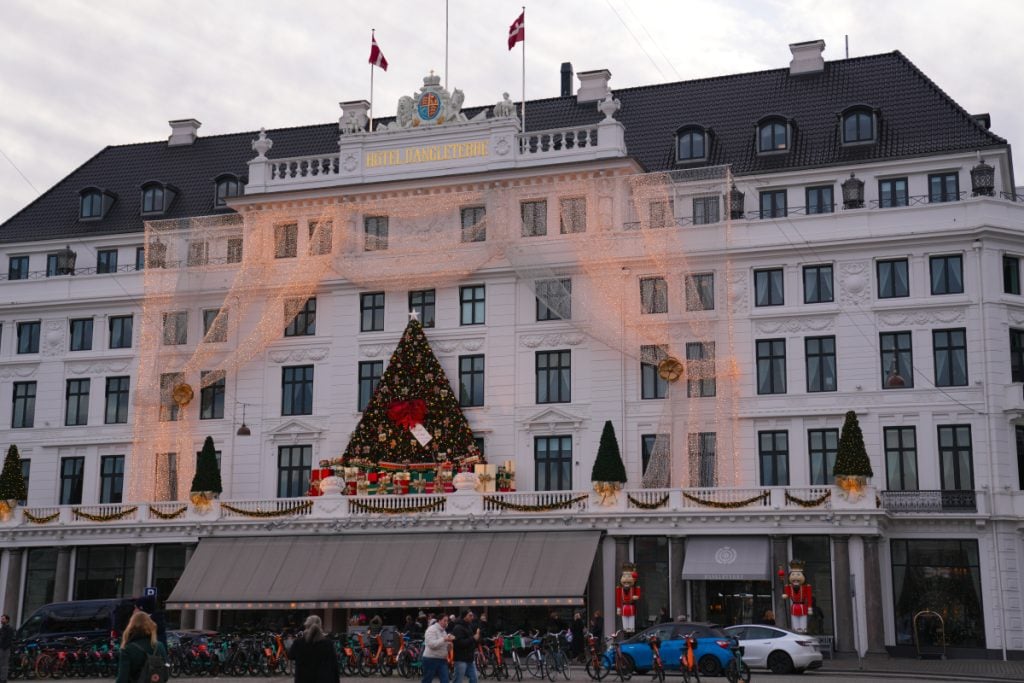 Christmas tree and lights on Hotel d'Angleterre's facade