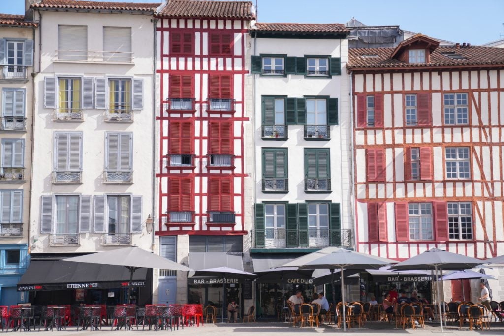 Half-timbered buildings and café terraces in Bayonne