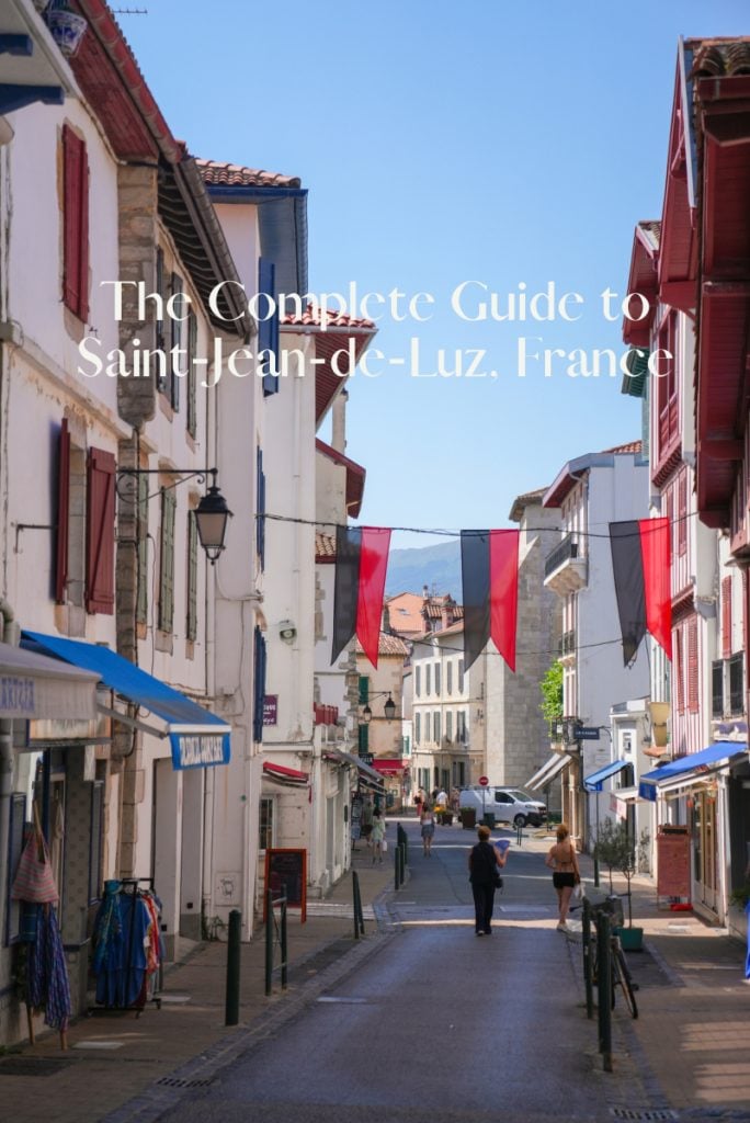 Pinterest graphic of a Saint-Jean-de-Luz street with bunting