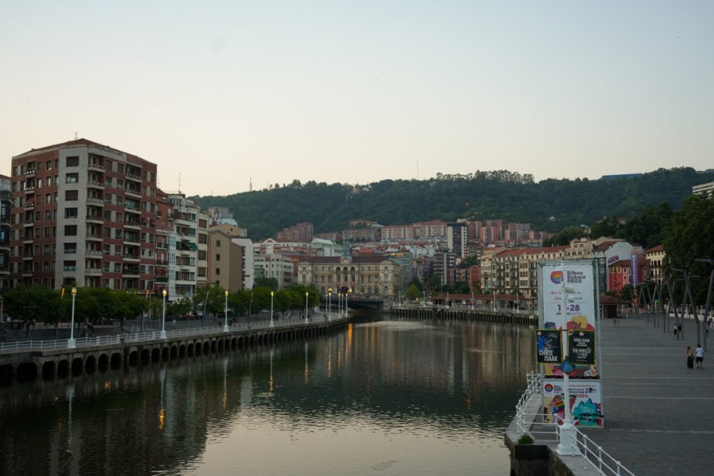 Riverside buildings along the Nervión River in Bilbao