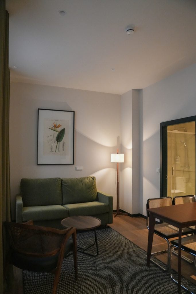 Living and dining area at Batimont Suites