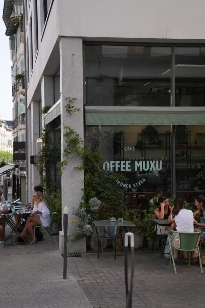 Diners outside Coffee Muxu in Bayonne