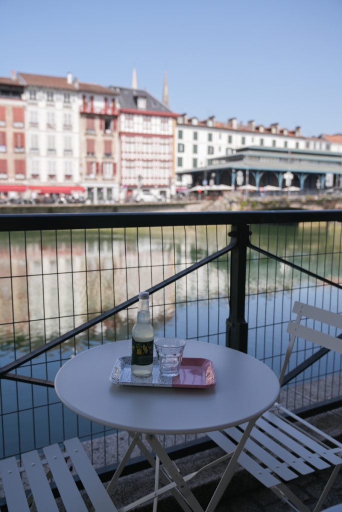 Café Rhubarbe terrace overlooking the Nive River in Bayonne