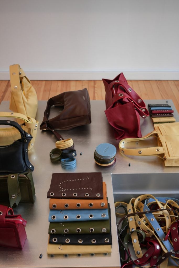 Colorful leather handbags and accessories at C'est Nous