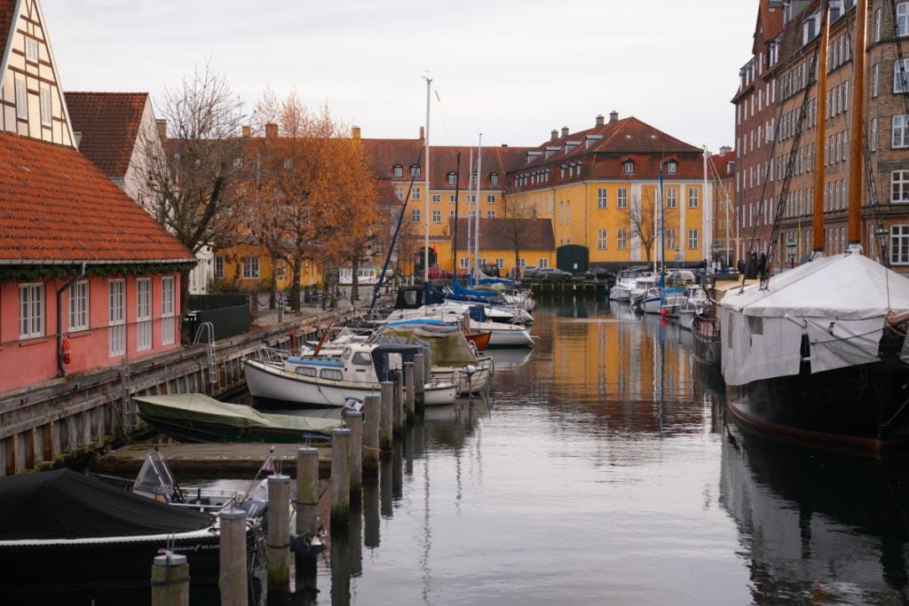 Boats moored in a canal near Christiania