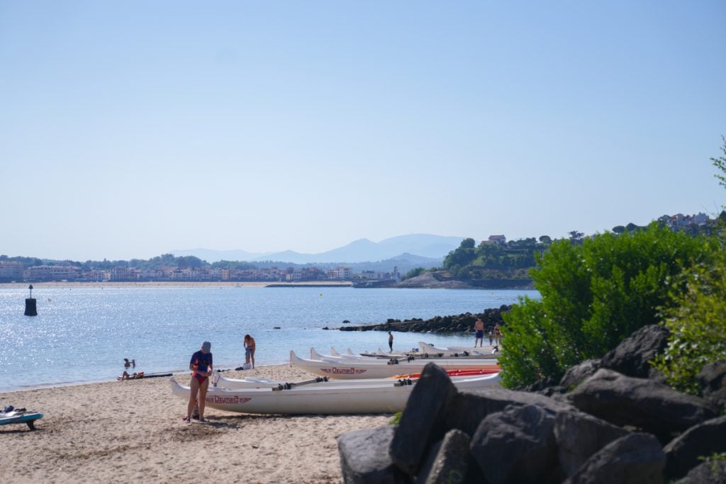 Boats pulled ashore on a beach in Ciboure