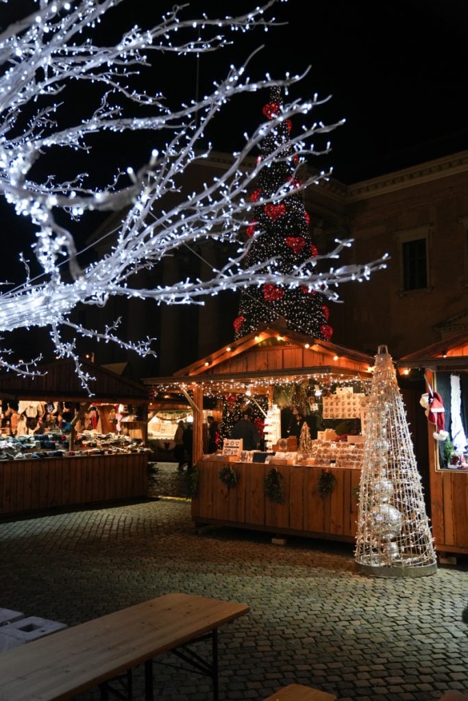 Illuminated stalls and Christmas tree at H.C. Andersen Market
