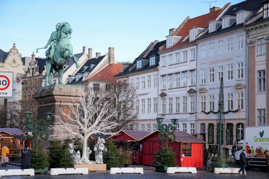 Christmas market stalls and equestrian statue at Højbro Plads