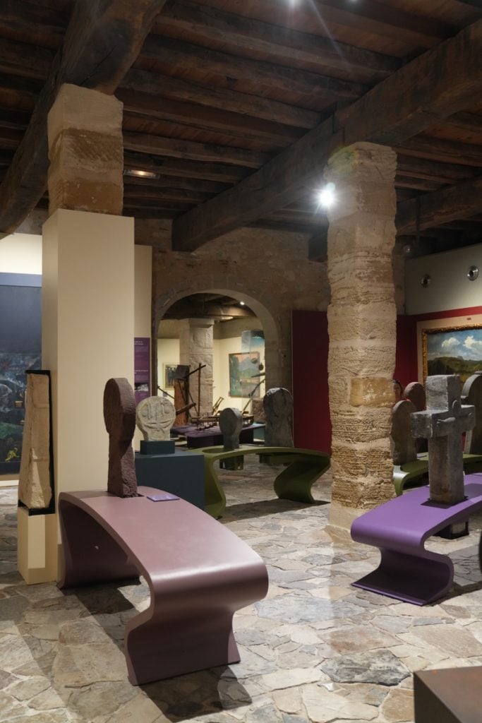 Stone artifacts displayed inside the Musée Basque