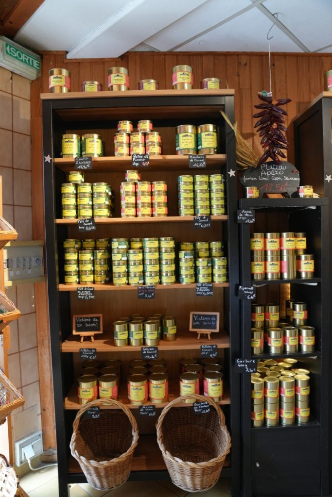 Shelves stocked with tins at Pierre Ibaïalde