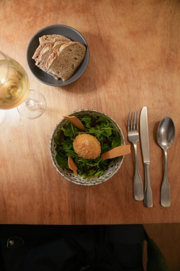 Oeuf croustillant, bread, and white wine at Relief