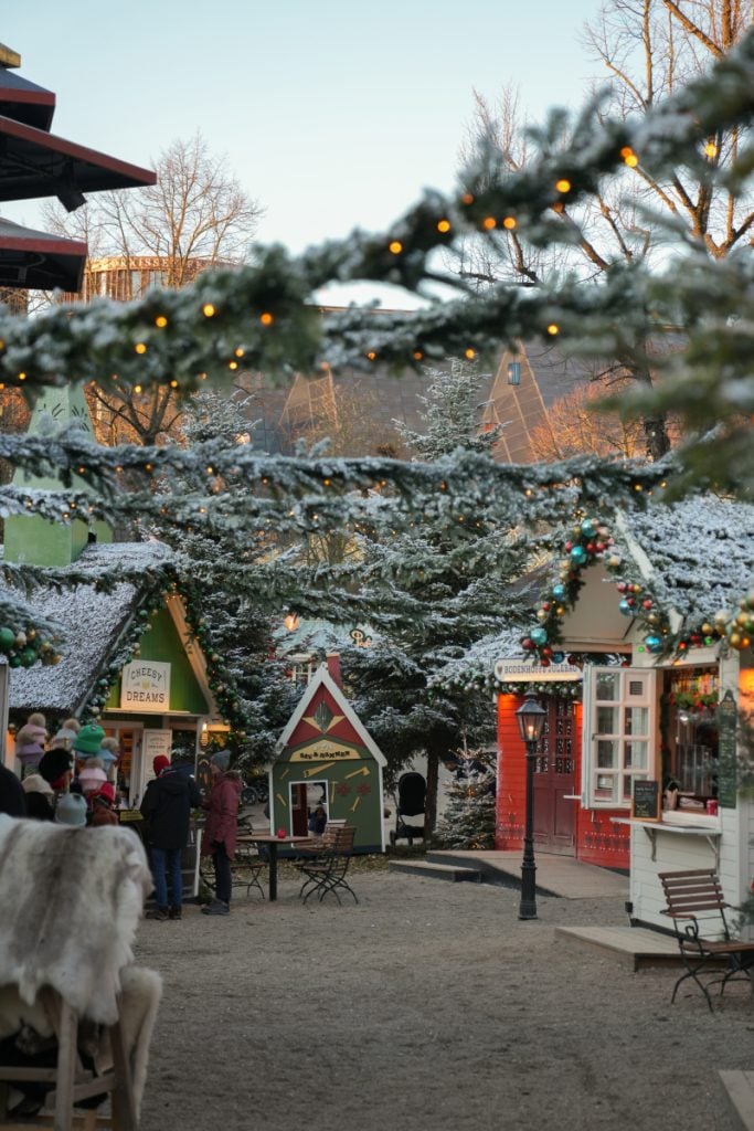 Snow-dusted Christmas stalls at Tivoli Gardens