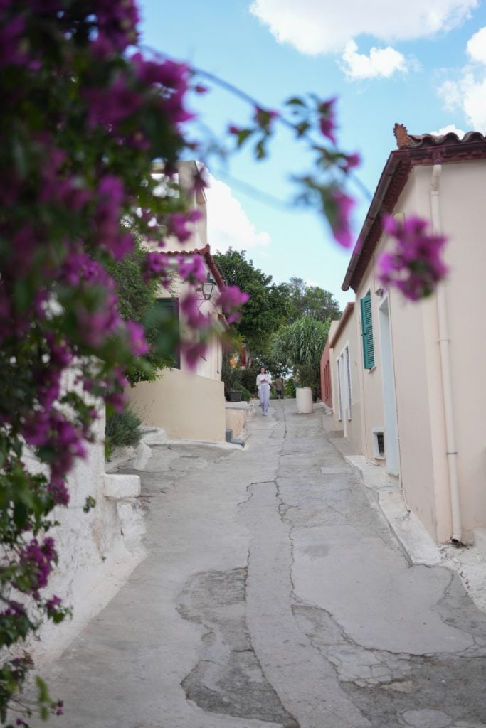 Bougainvillea frames a steep lane through Anafiotika