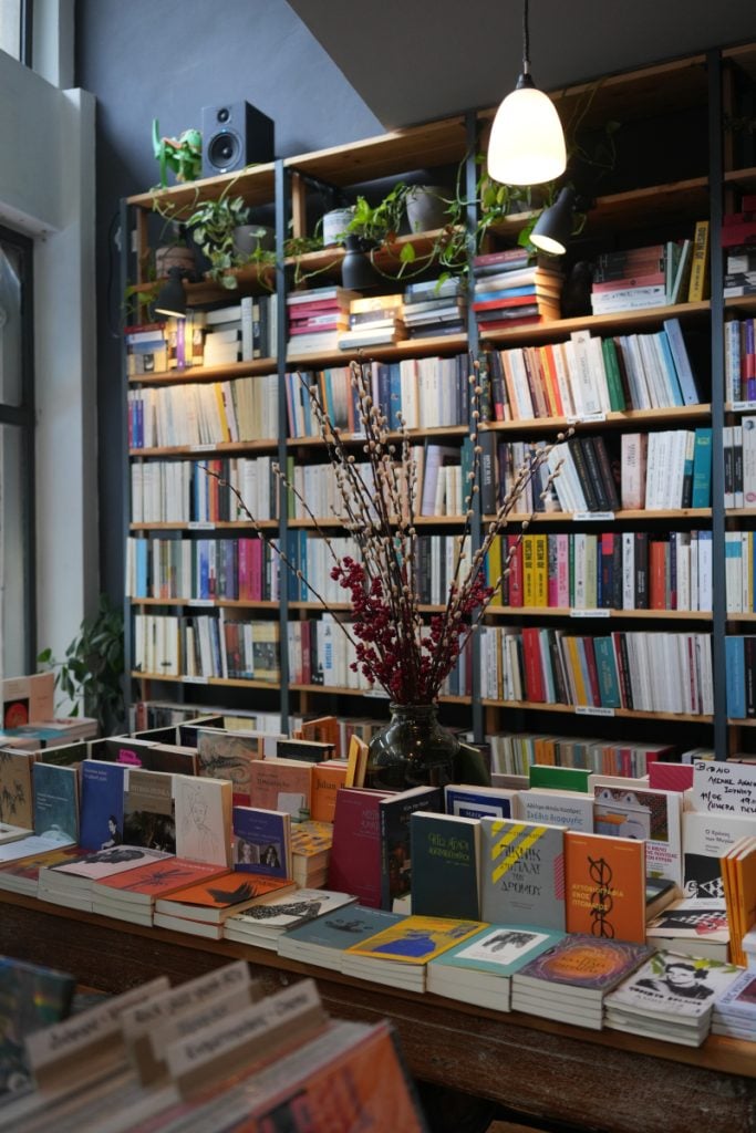 Books displayed inside Little Tree Books and Coffee